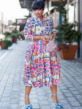 Robe midi à manches longues et col en V à imprimé floral